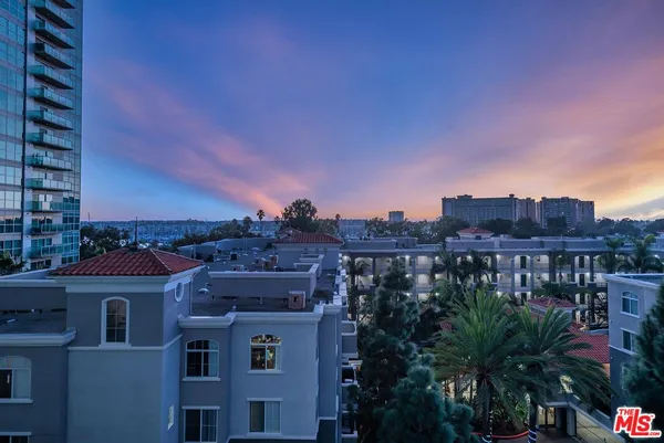 a view of a city with tall buildings