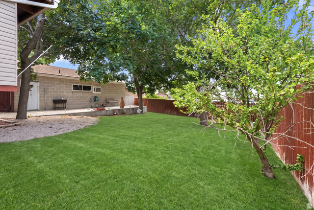 9890 Tonya Drive Sandy, UT 84070 - Photo 28 of 32 yard enhanced