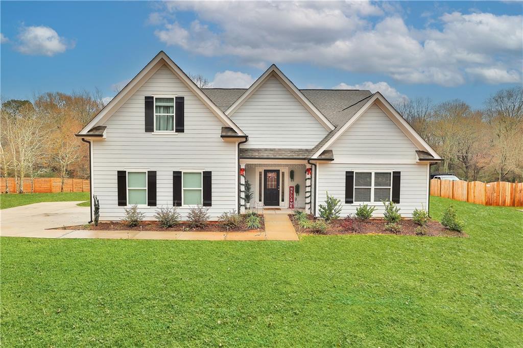 528 Elder Road Winder, GA 30680 - Photo 1 of 1 a front view of house with yard and patio