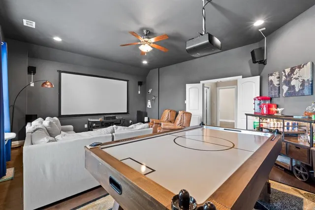 a room with furniture and a flat screen tv