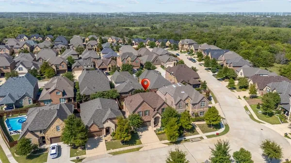 an aerial view of multiple house