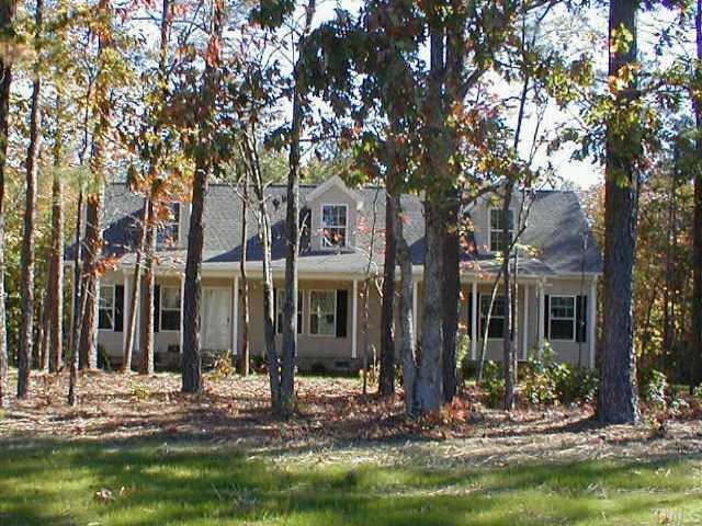 2167 Bobbitt Road Kittrell, NC 27544 - Photo 1 of 1 a front view of a house with yard tree and outdoor seating