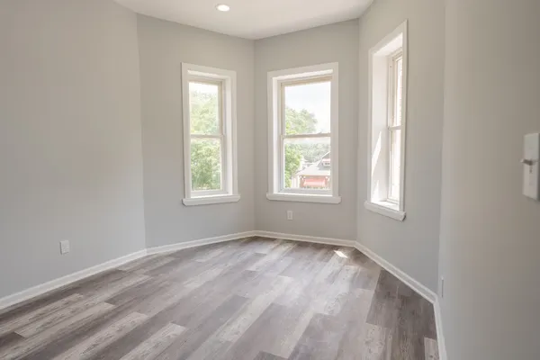 an empty room with windows