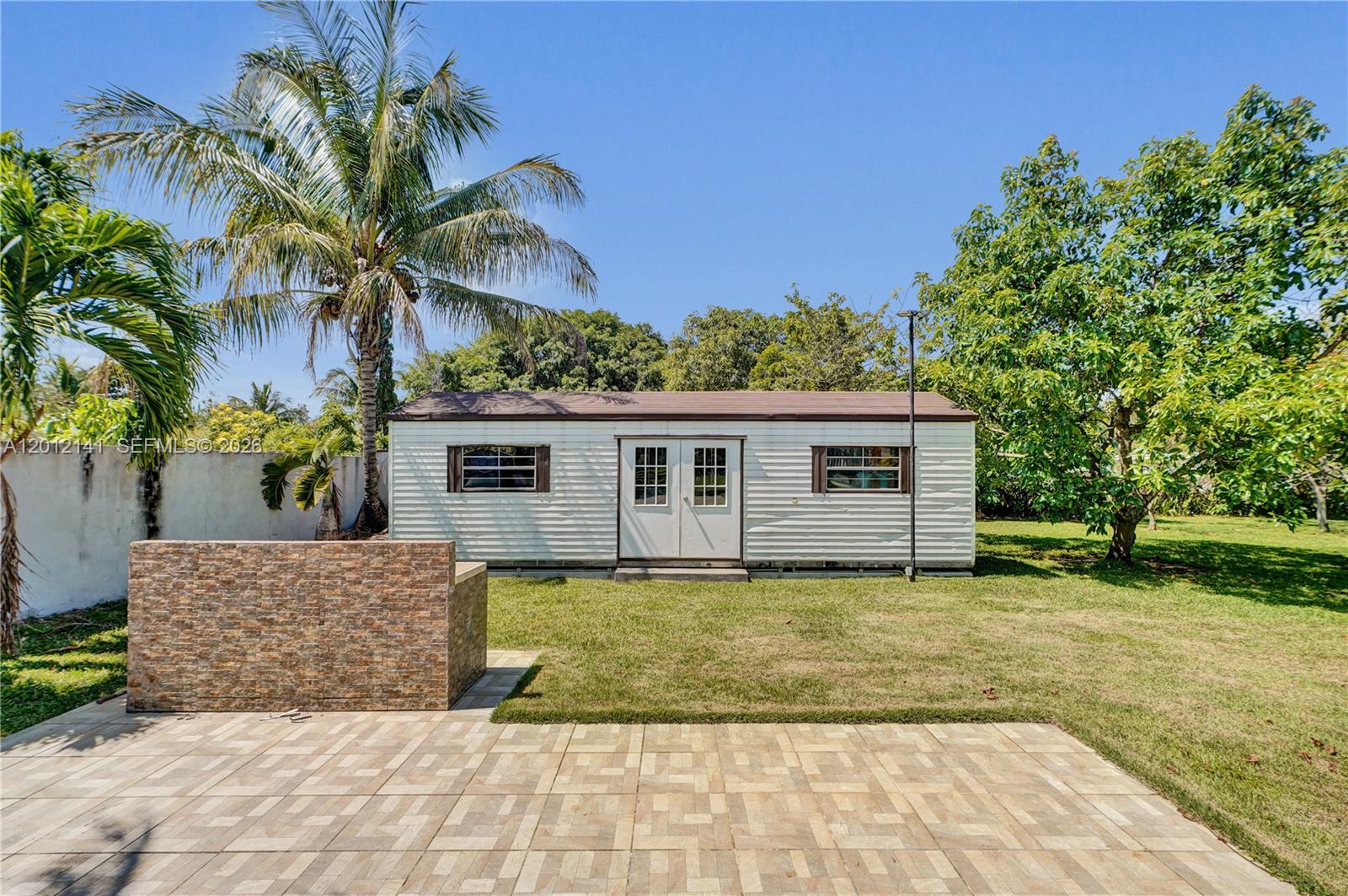 12401 Southwest 45th Street Miami, FL 33175 - Photo 68 of 79 Storage Shed