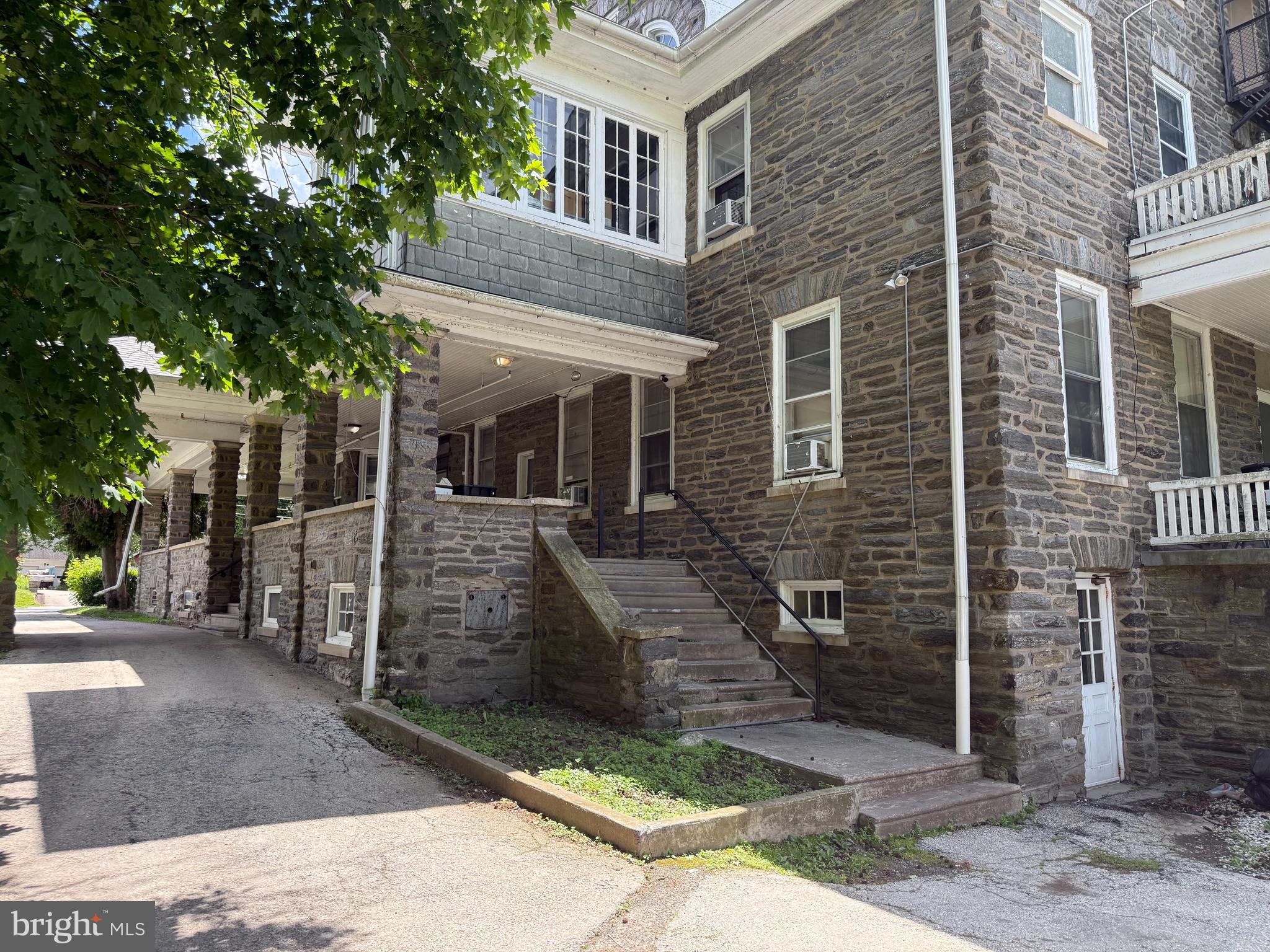31 West Mill Road Flourtown, PA 19031 - Photo 4 of 12 a front view of a house with stairs