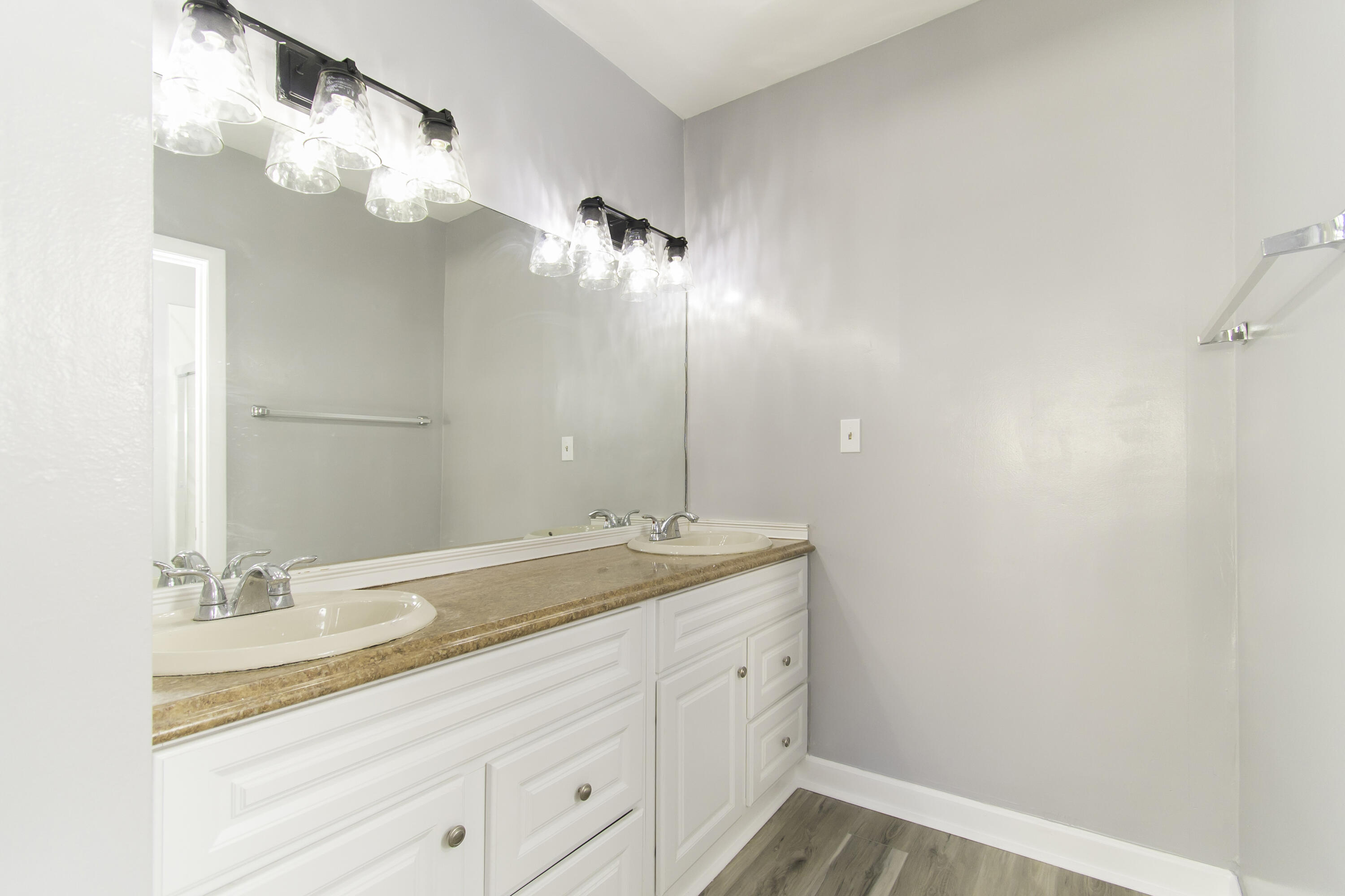 1571 Southwest 13th Drive Boca Raton, FL 33486 - Photo 12 of 21 a bathroom with a sink and a mirror