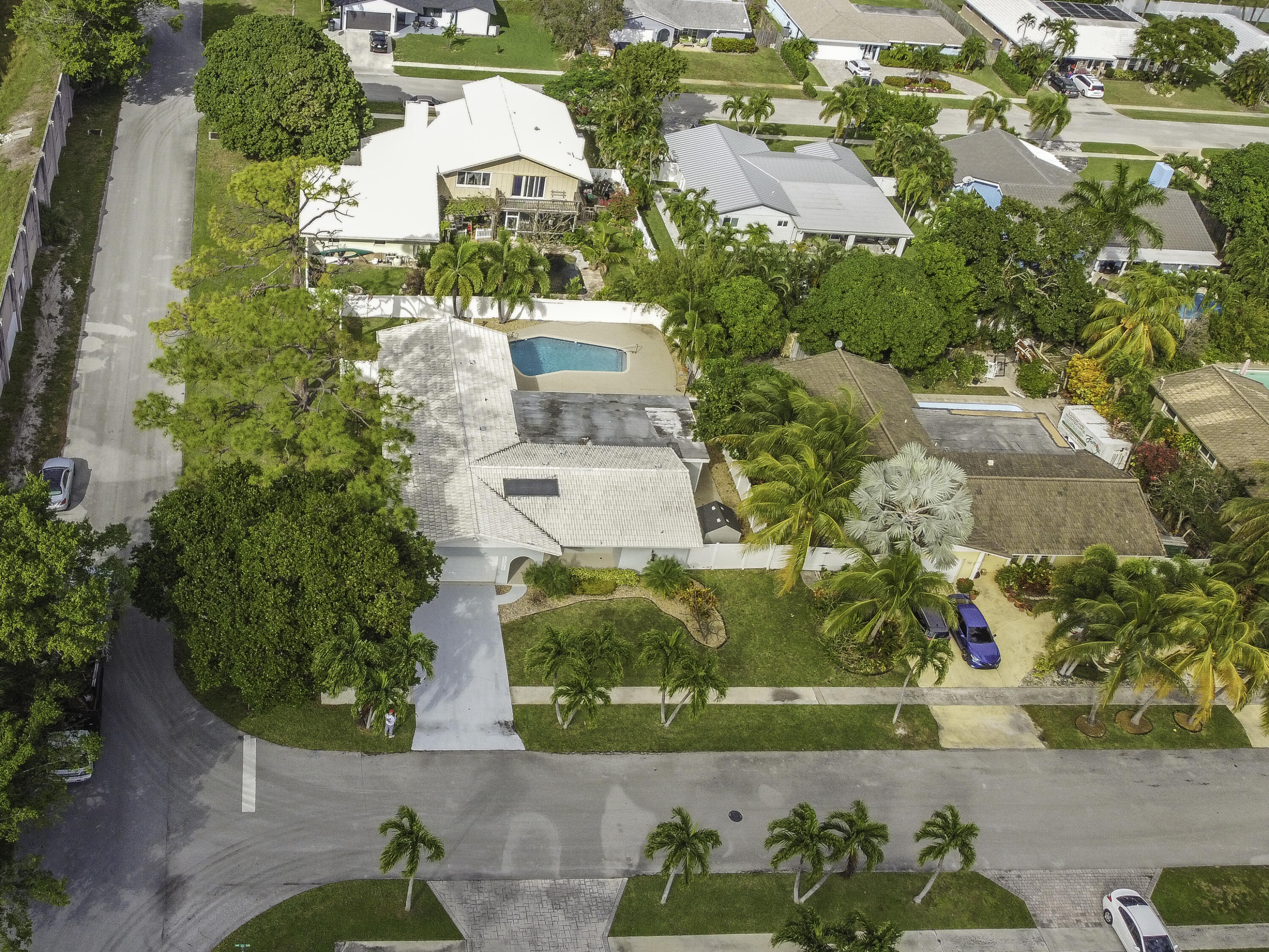 1571 Southwest 13th Drive Boca Raton, FL 33486 - Photo 20 of 21 an aerial view of residential houses with outdoor space