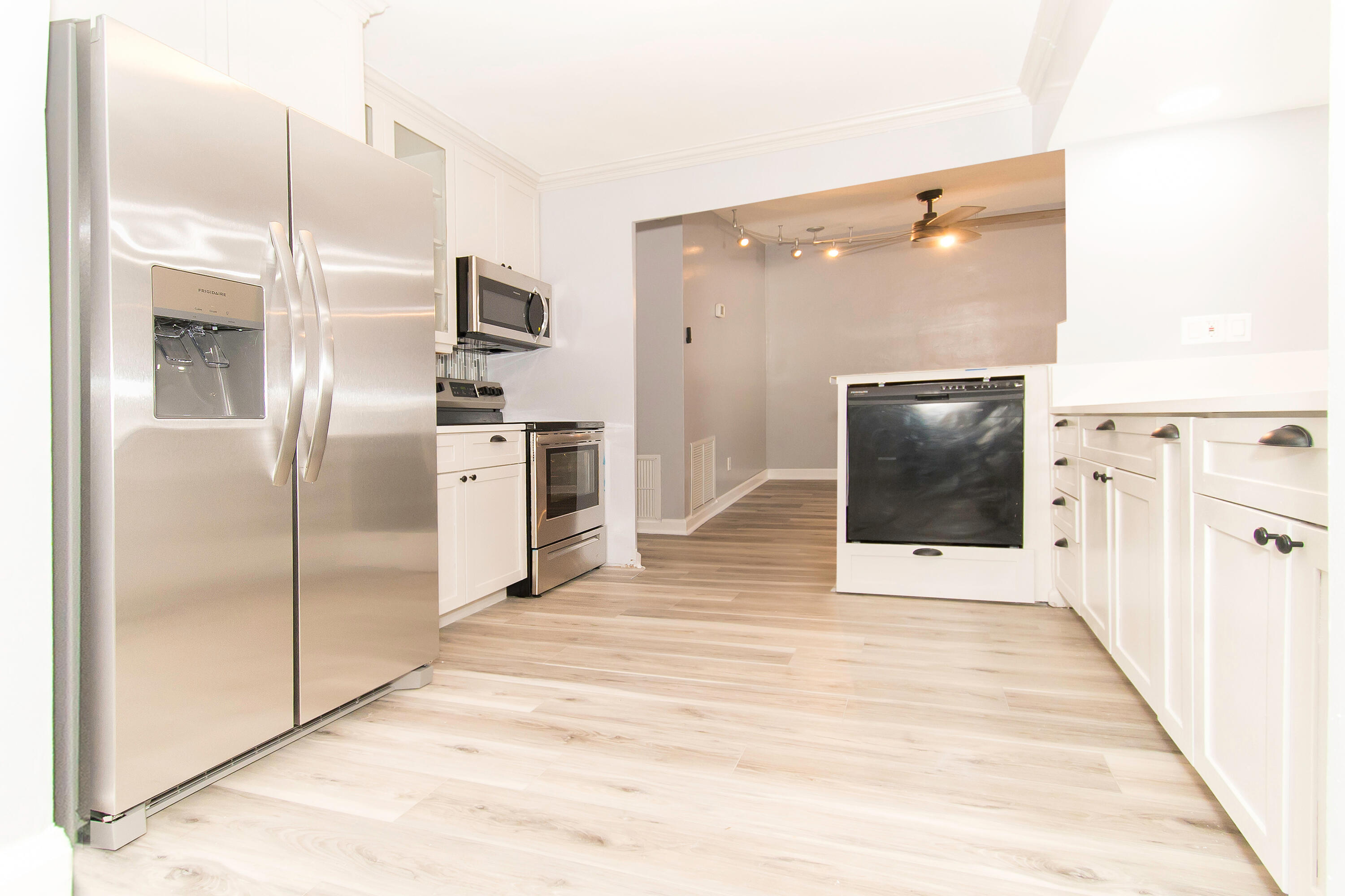 1571 Southwest 13th Drive Boca Raton, FL 33486 - Photo 3 of 21 a view of a kitchen with a sink