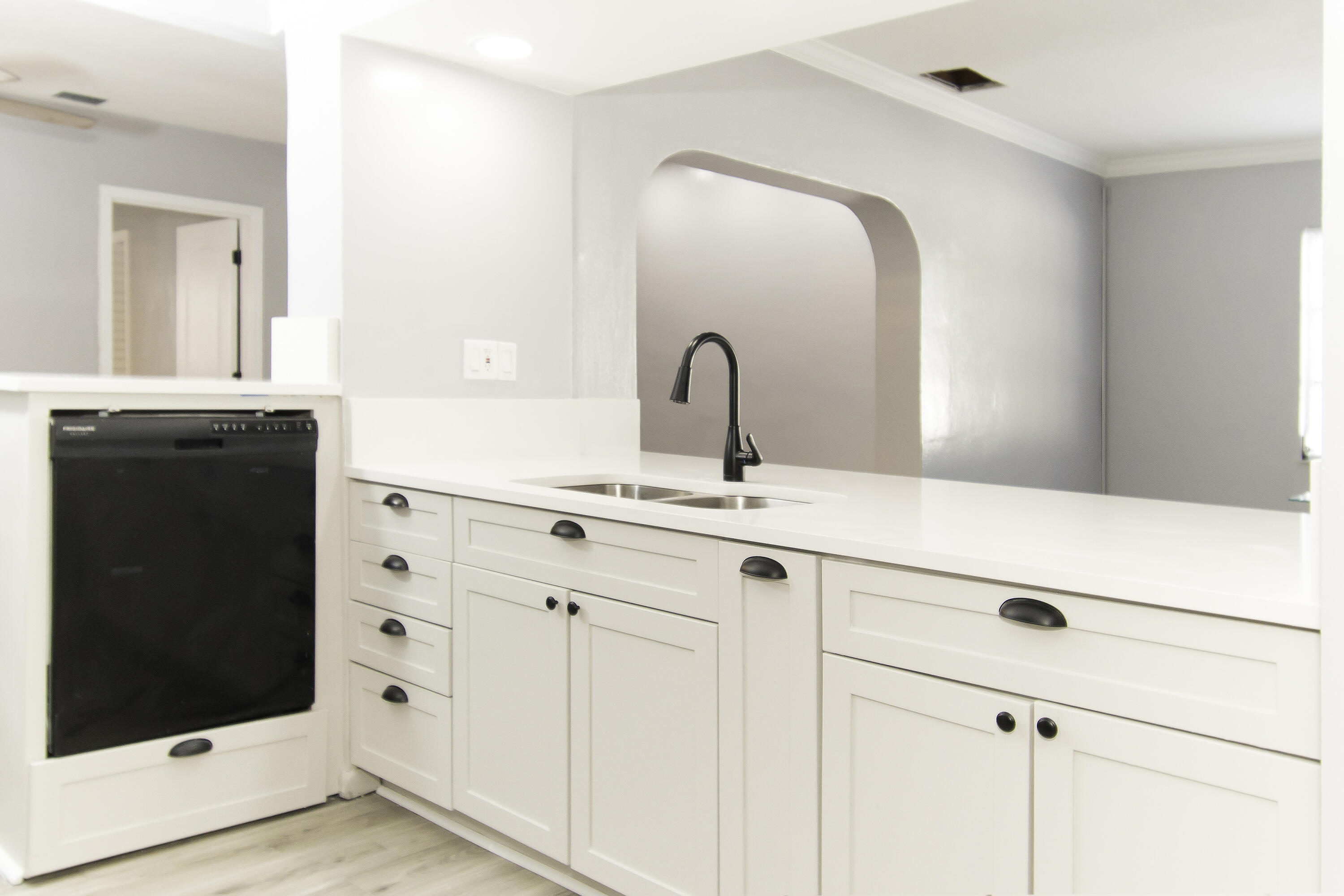 1571 Southwest 13th Drive Boca Raton, FL 33486 - Photo 6 of 21 a bathroom with a sink and mirror