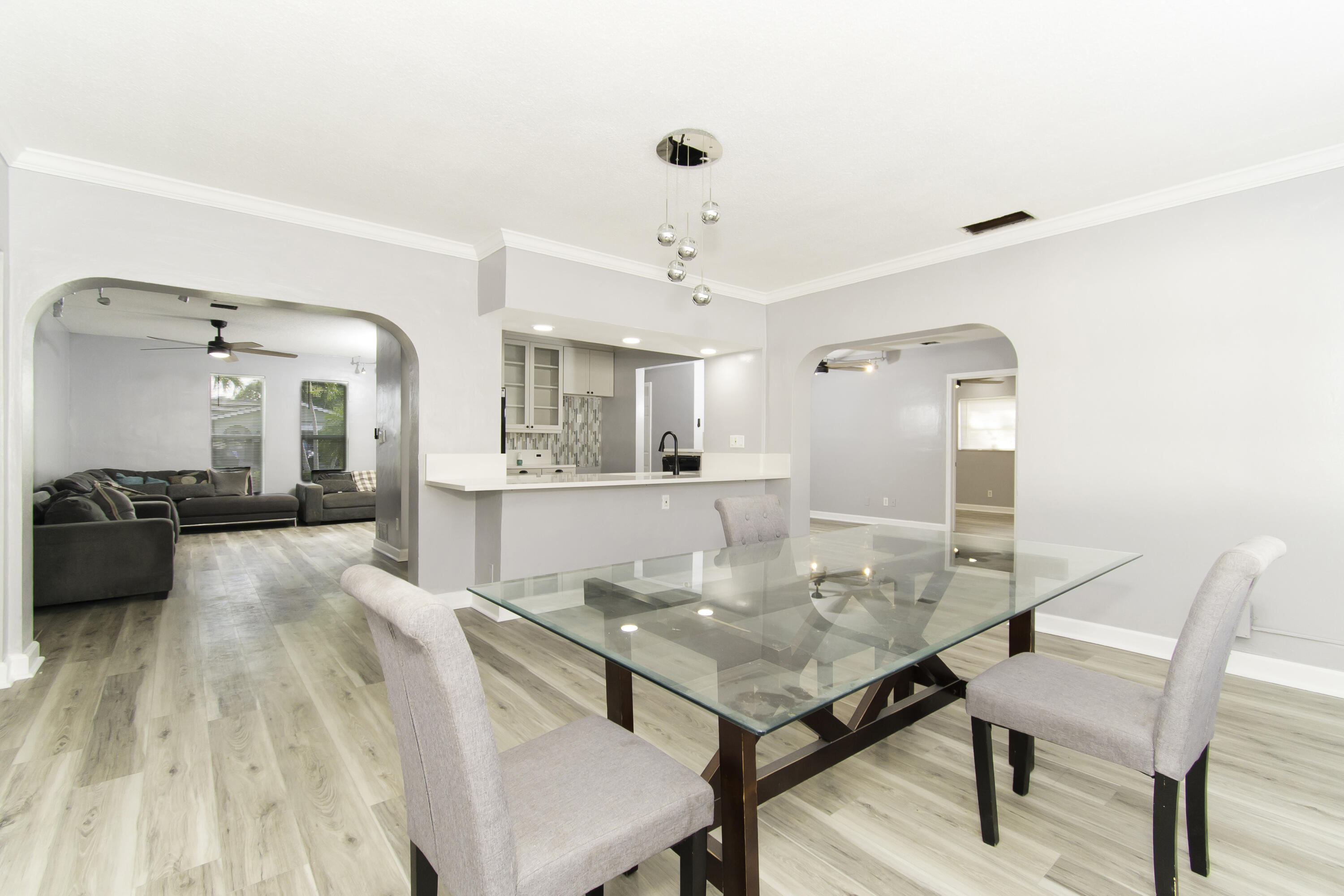 1571 Southwest 13th Drive Boca Raton, FL 33486 - Photo 7 of 21 a view of a dining room with furniture
