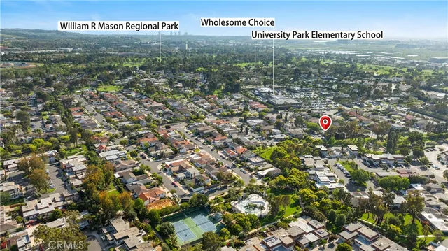 an aerial view of residential house with outdoor space and street view