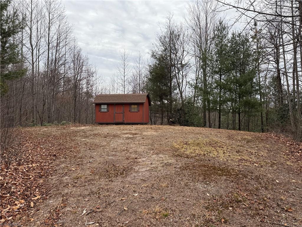 Lot 218 Casey Mountain Road Purlear, NC 28665 - Photo 9 of 42 Storage Shed located on one of the potential building sites