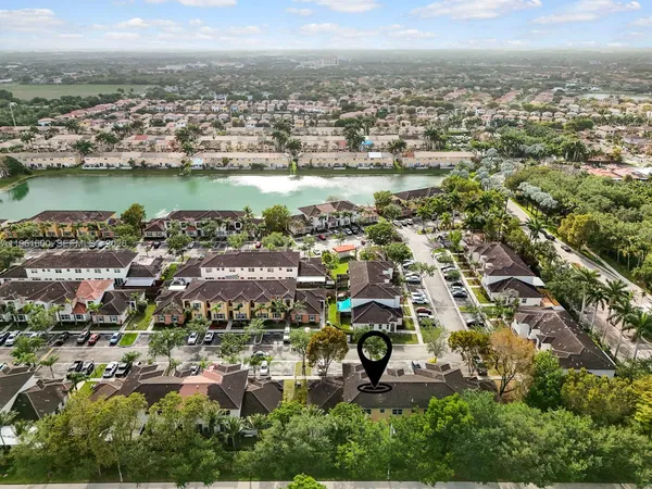 an aerial view of residential building with outdoor space