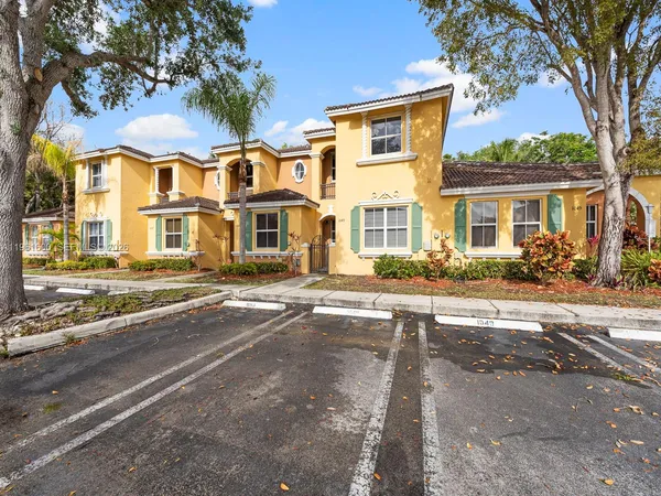 front view of a house with a street
