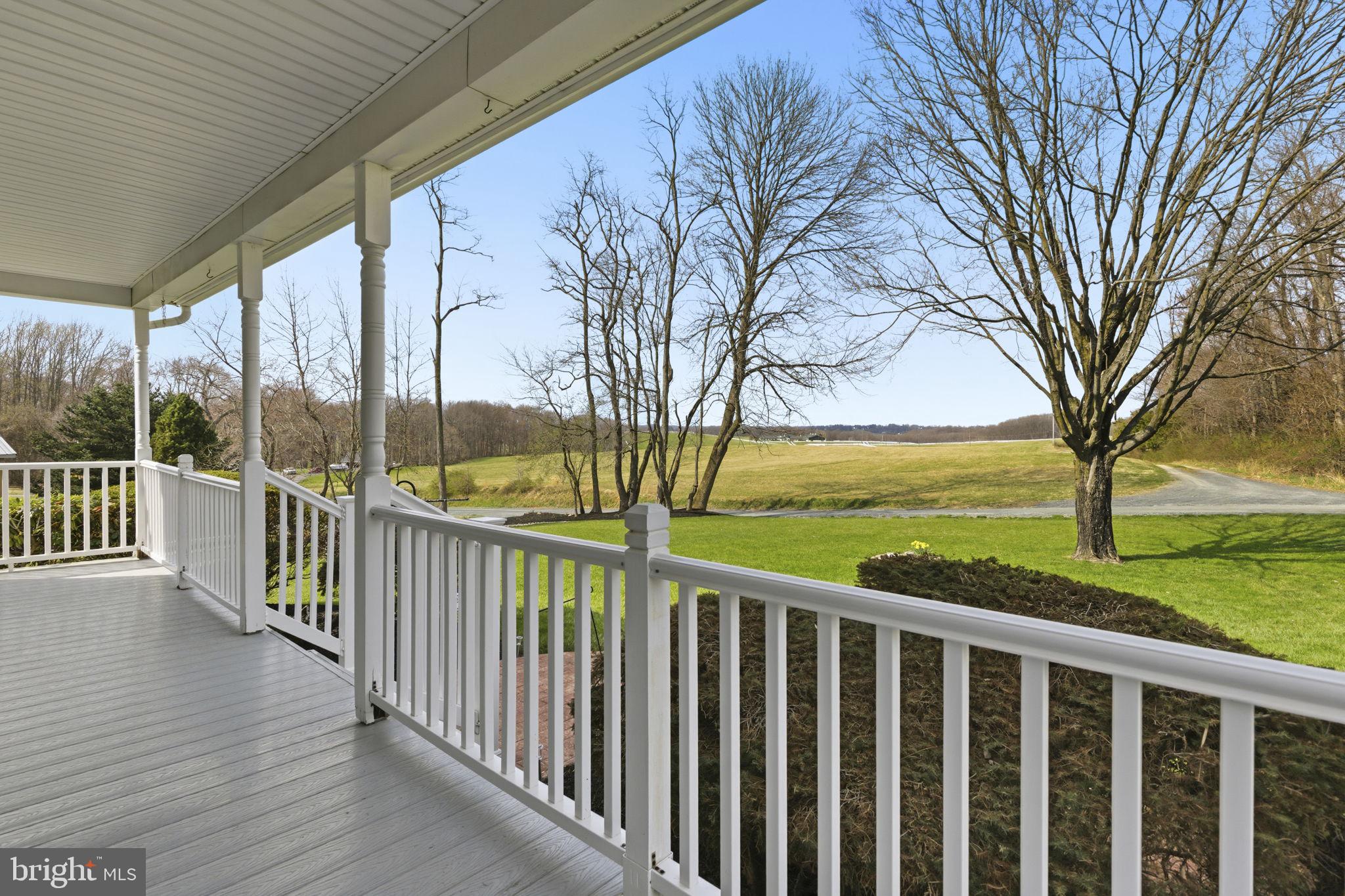 3831 Wilkinson Road Havre de Grace, MD 21078 - Photo 47 of 51 a view of a deck with large trees and wooden fence