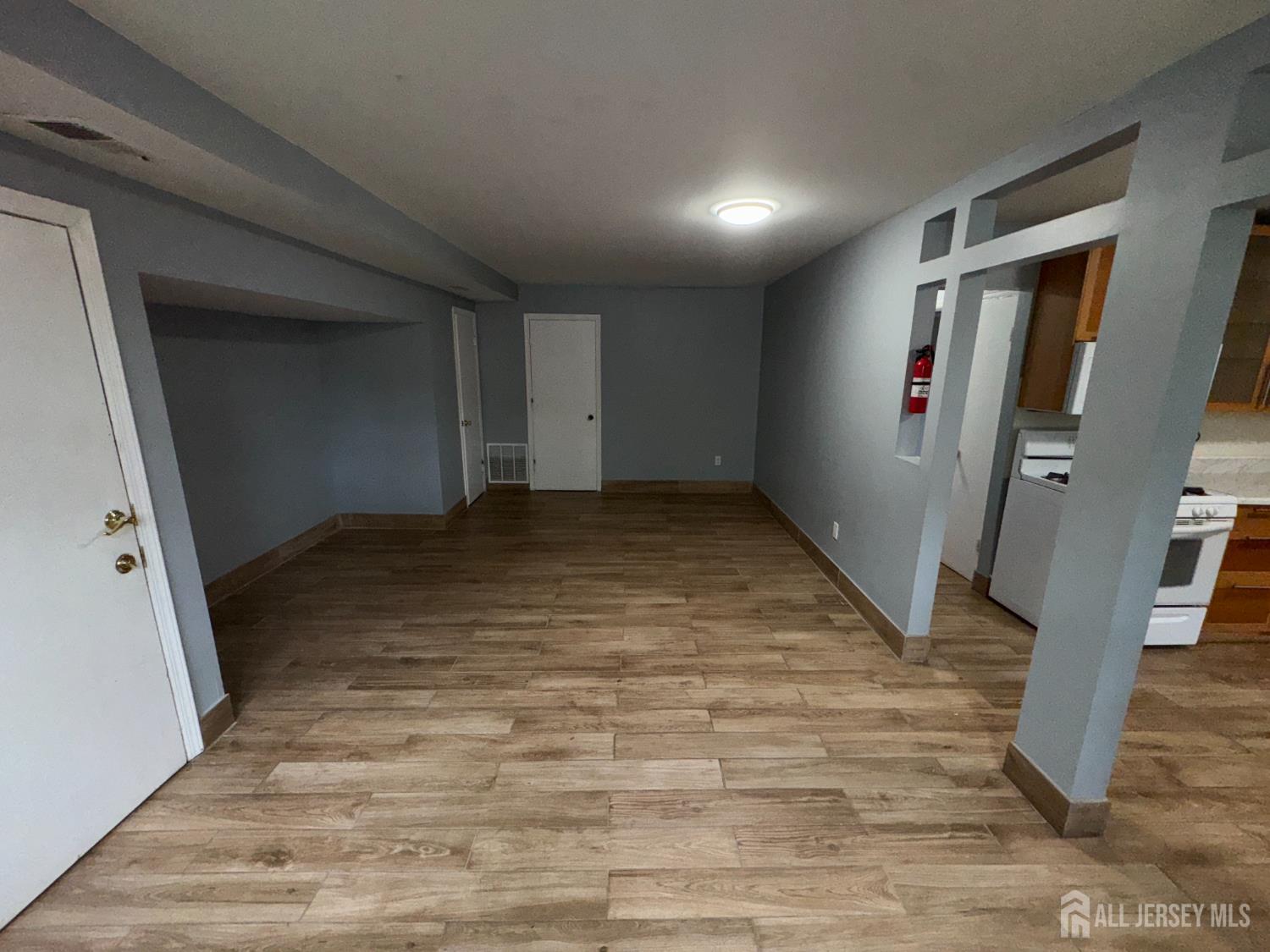 76 College Drive Edison, NJ 08817 - Photo 9 of 16 a view of empty room