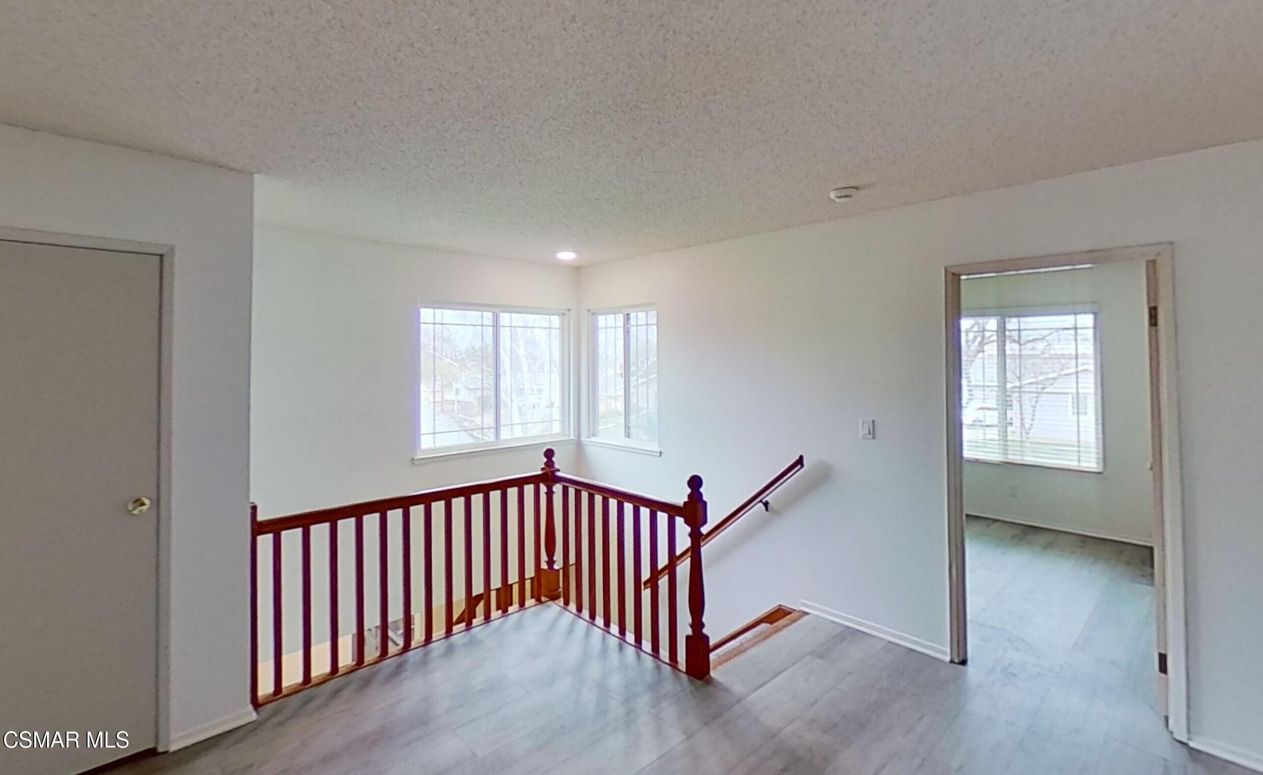 577 Appleton Road Simi Valley, CA 93065 - Photo 19 of 31 a view of a hallway with windows