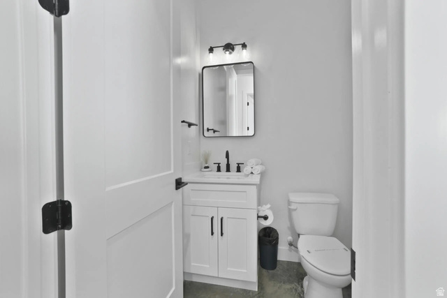4346 Canterbury Road Hurricane, UT 84737 - Photo 14 of 37 Bathroom with vanity and toilet