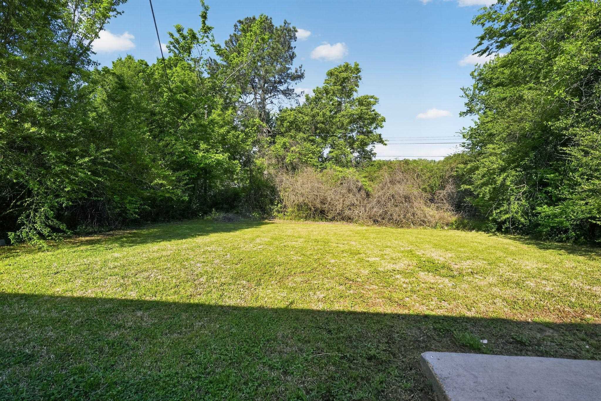 4587 Appleville Street Memphis, TN 38109 - Photo 29 of 34 View of green lawn