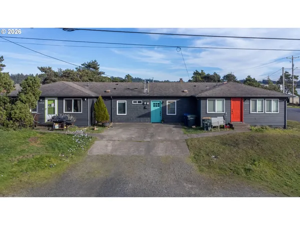 a house view with a garden space