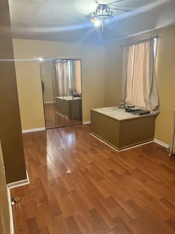 a view of livingroom with hardwood floor and window