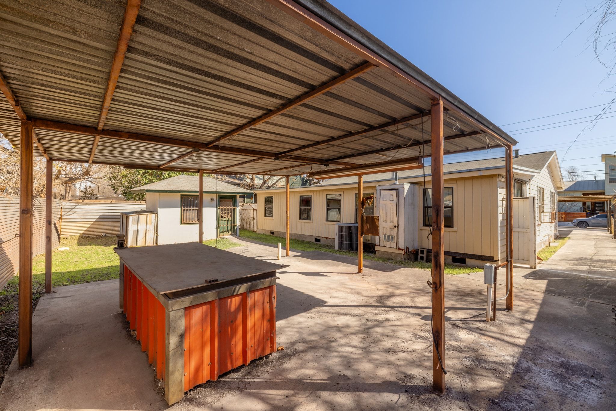 1114 Richardine Avenue Austin, TX 78721 - Photo 27 of 27 a outdoor space with patio lots of furniture and white umbrellas
