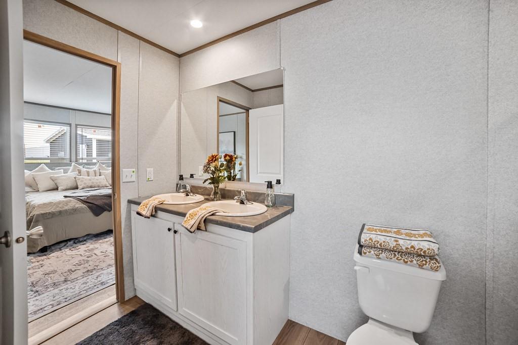 2013 Buffet Way Poolville, TX 76487 - Photo 19 of 37 a bathroom with a sink toilet and shower