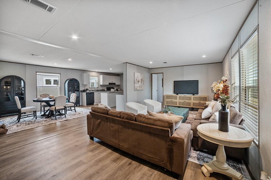 2013 Buffet Way Poolville, TX 76487 - Photo 4 of 37 a living room with furniture and a flat screen tv