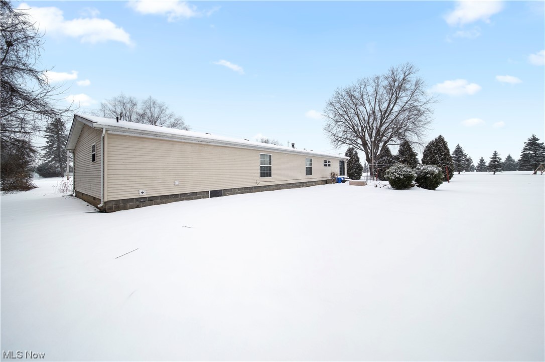 4951 Lane Road Perry, OH 44081 - Photo 30 of 31 View of yard covered in snow