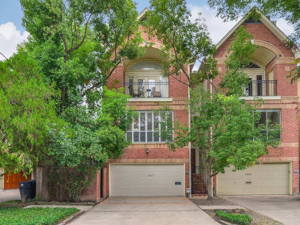 This stately brick townhouse is just a couple minutes walk from Memorial Park