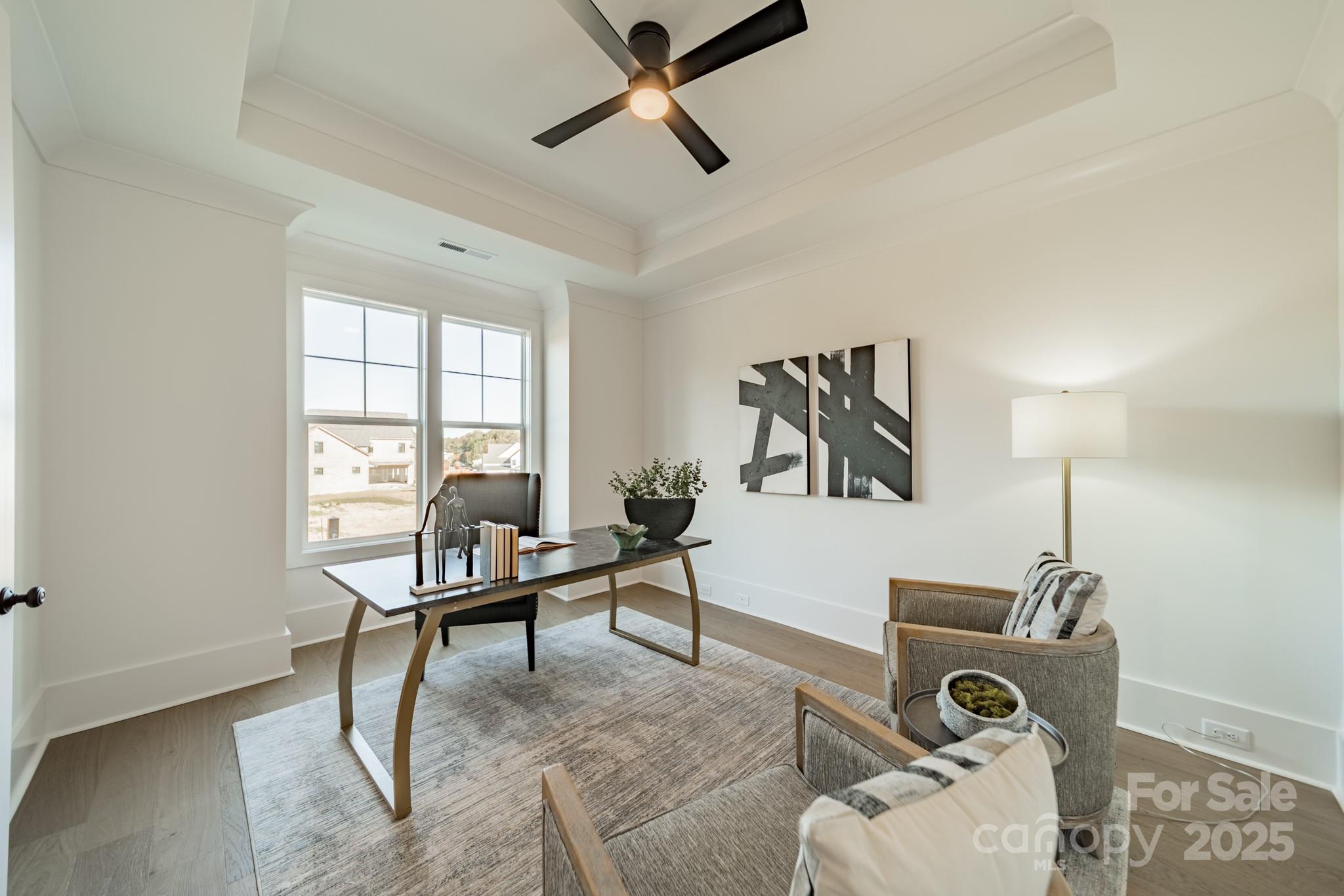19032 Newburg Hill Road, Unit 23 Davidson, NC 28036 - Photo 23 of 39 a living room with furniture and a window