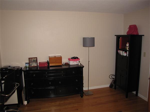 121 Cambridge Road, Unit 3 Woburn, MA 01801 - Photo 17 of 21 a living room with furniture and a mirror