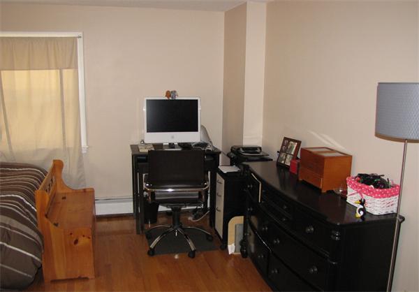 121 Cambridge Road, Unit 3 Woburn, MA 01801 - Photo 18 of 21 a bedroom with a workspace