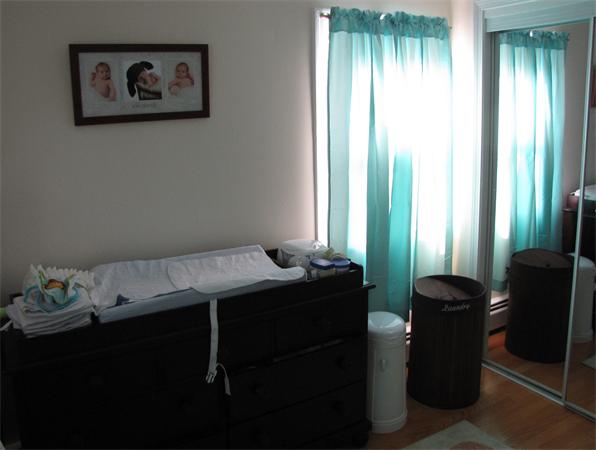 121 Cambridge Road, Unit 3 Woburn, MA 01801 - Photo 21 of 21 a room with furniture and a window