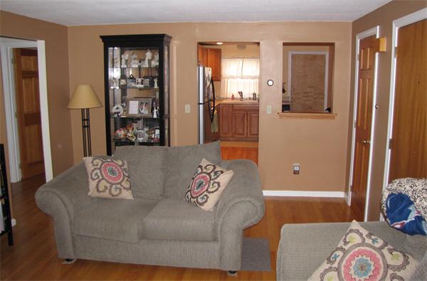 121 Cambridge Road, Unit 3 Woburn, MA 01801 - Photo 6 of 21 a living room with furniture and window