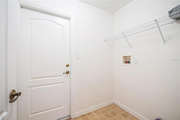 a view of a bathroom from a hallway