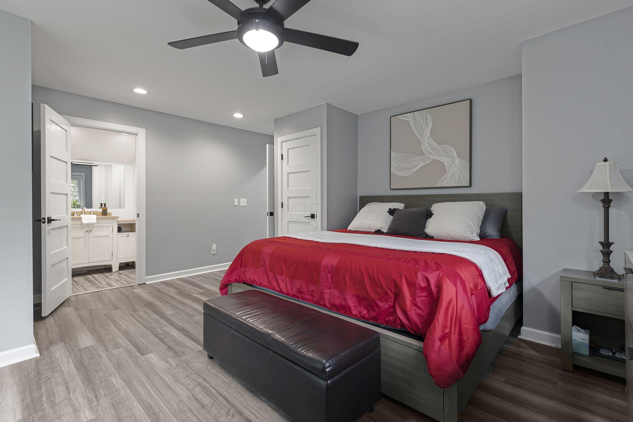 7140 Cook Road Powell, OH 43065 - Photo 62 of 87 Recessed lighting, wood-finish flooring, and a ceiling fan with integrated lighting