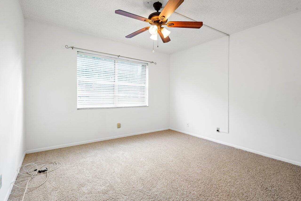 1024 Northwest 13th Street, Unit 127B Boca Raton, FL 33486 - Photo 14 of 21 Guest Bedroom