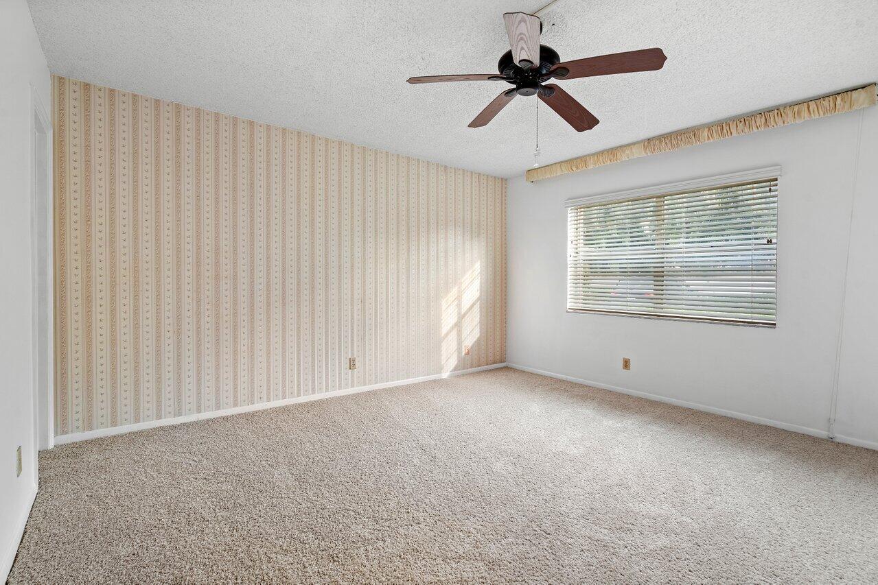 1024 Northwest 13th Street, Unit 127B Boca Raton, FL 33486 - Photo 10 of 21 Primary Bedroom