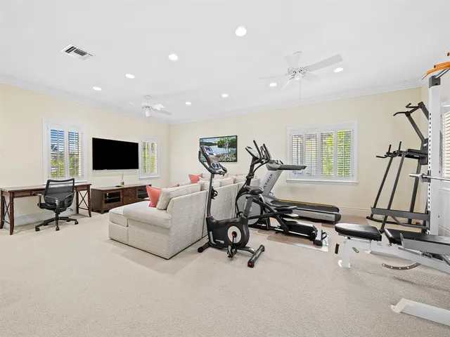 a view of a building with a backyard