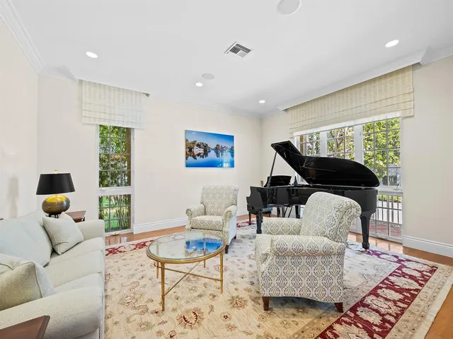 a living room with furniture and a table