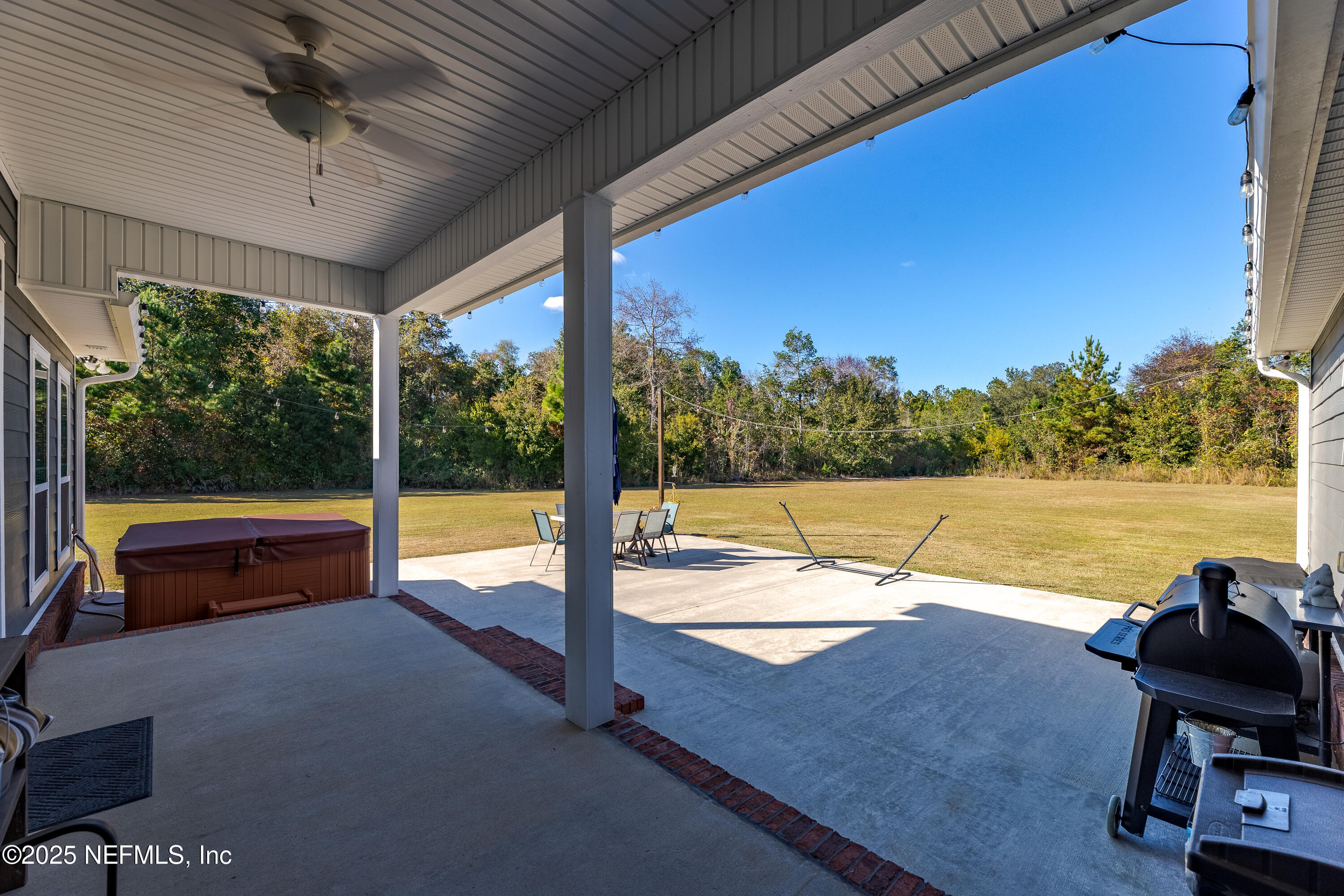 3670 Charles Green Road Hilliard, FL 32046 - Photo 17 of 68 a view of a swimming pool and outdoor space