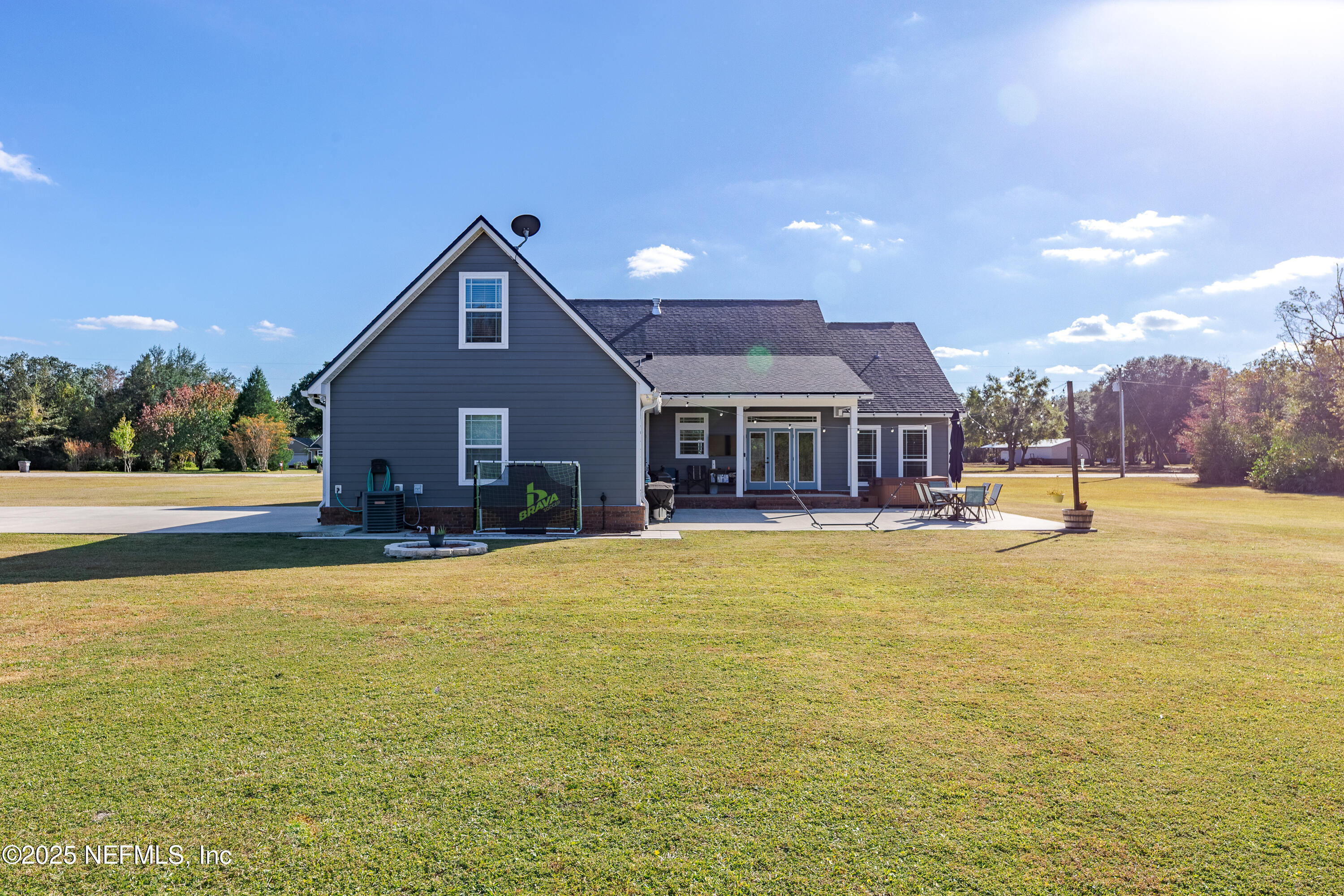 3670 Charles Green Road Hilliard, FL 32046 - Photo 54 of 68 a front view of house with outdoor space and swimming pool