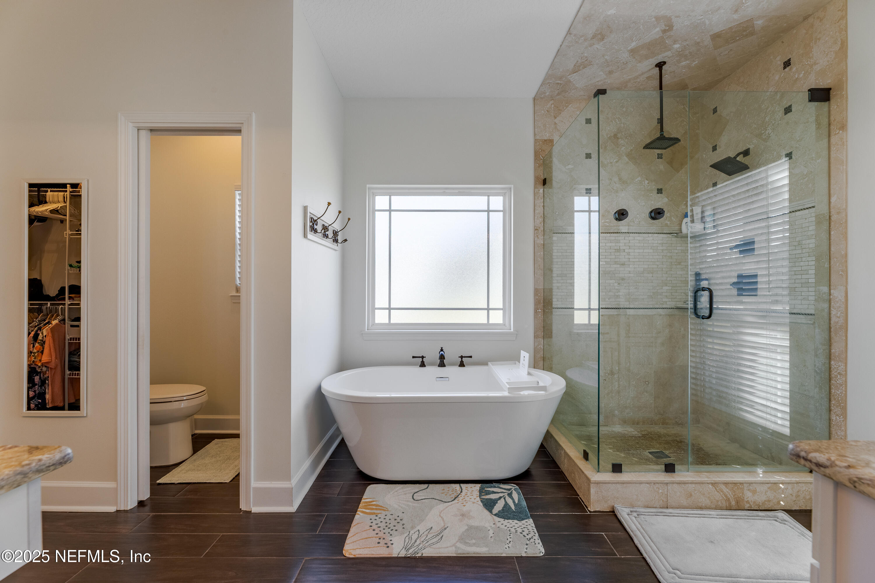 3670 Charles Green Road Hilliard, FL 32046 - Photo 6 of 68 a bathroom with a sink toilet and shower