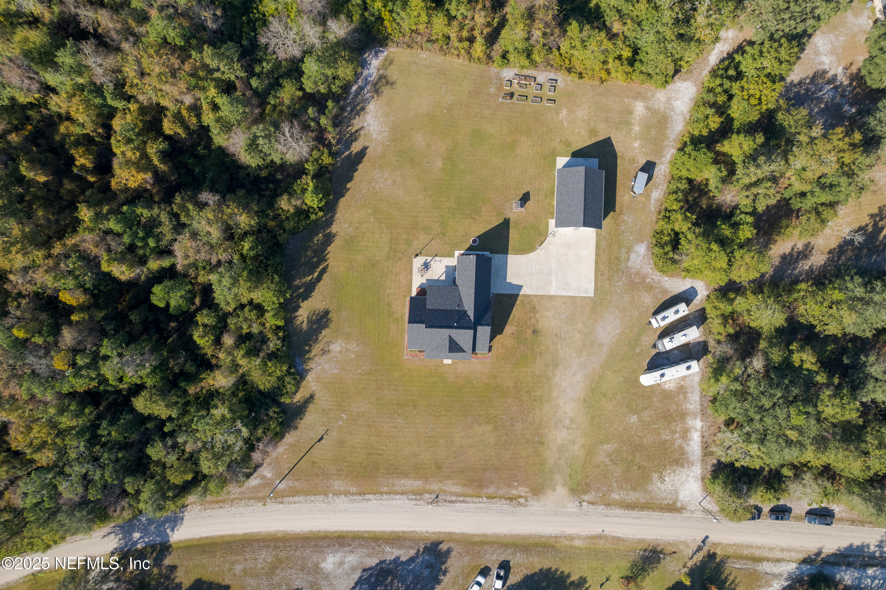 3670 Charles Green Road Hilliard, FL 32046 - Photo 61 of 68 an aerial view of residential house with outdoor space