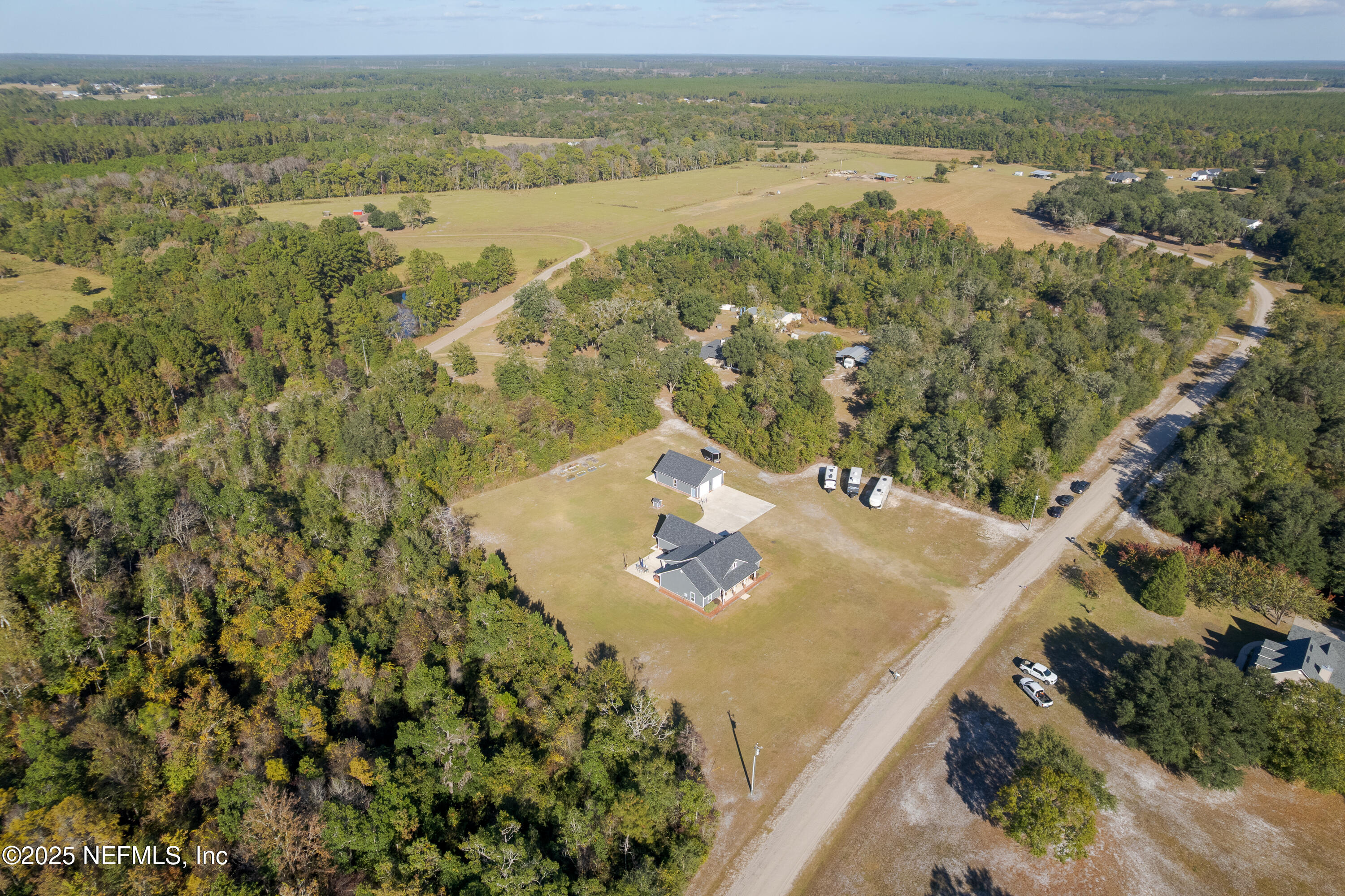 3670 Charles Green Road Hilliard, FL 32046 - Photo 10 of 68 a view of a lake with a mountain