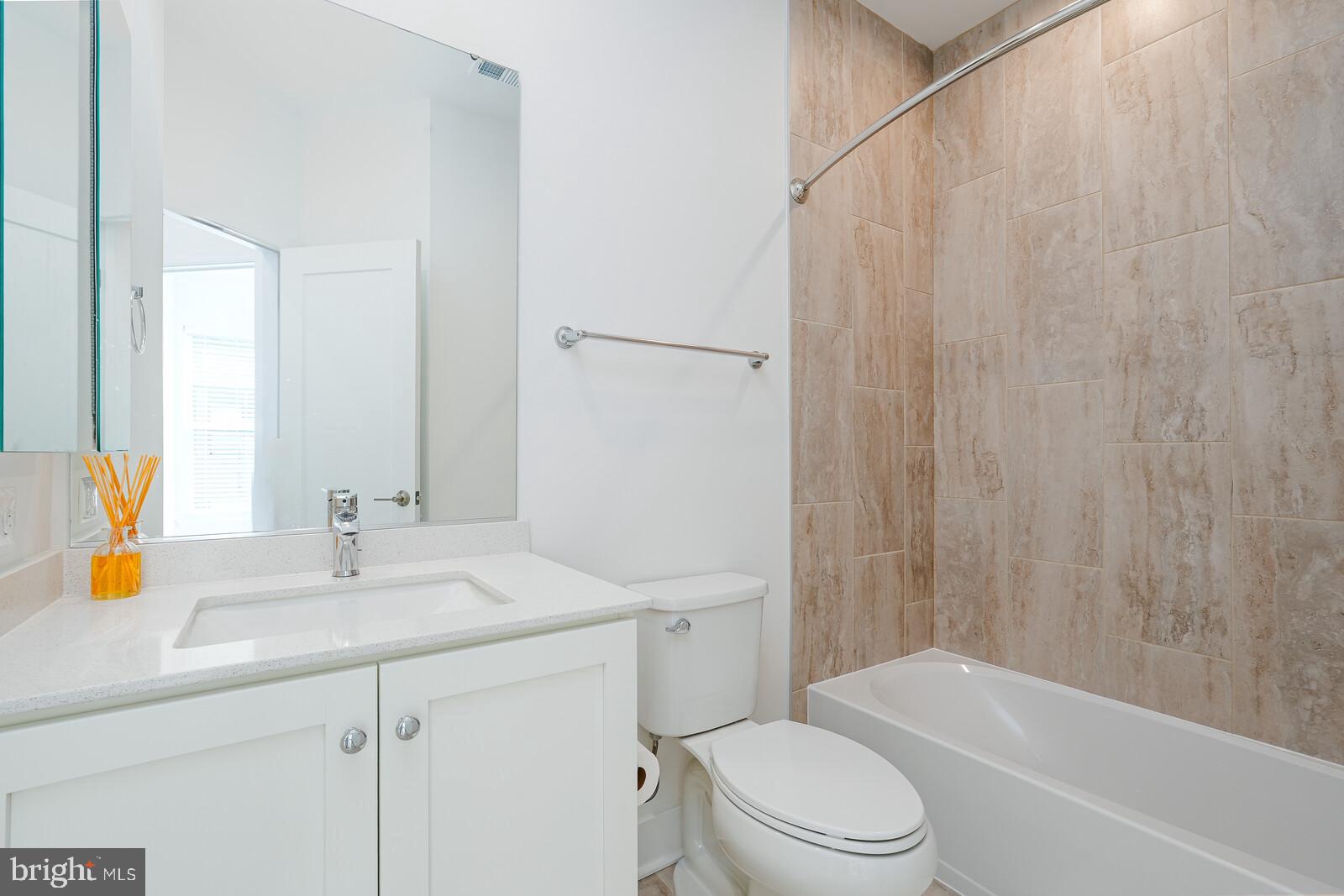 5345 Zenith Overlook Bethesda, MD 20816 - Photo 41 of 53 a bathroom with a sink a toilet and shower