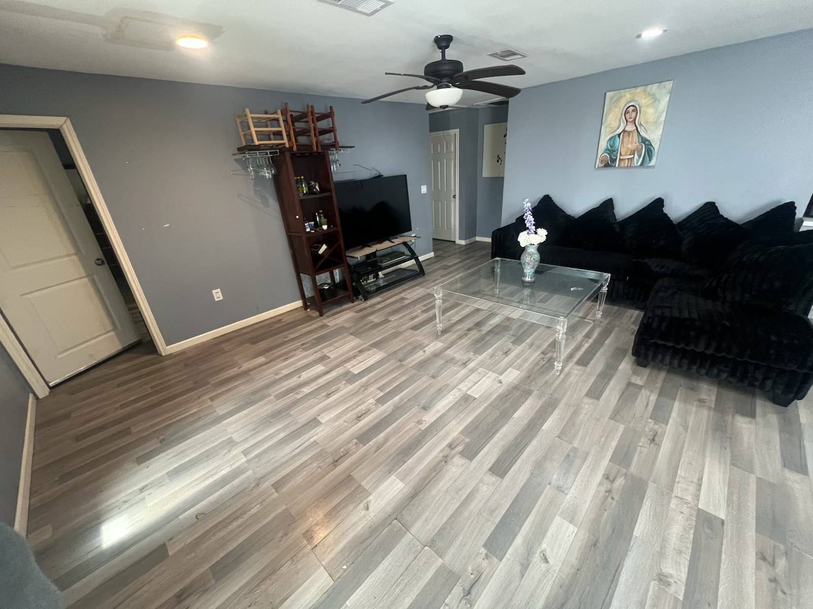 221 Calloway Street Houston, TX 77029 - Photo 2 of 9 a view of workspace with wooden floor