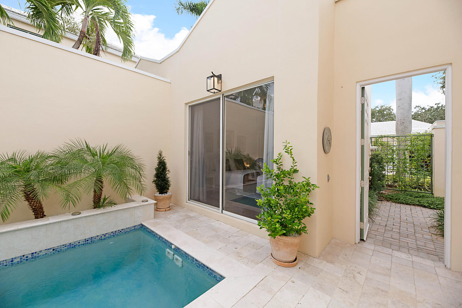 17258 Bermuda Village Drive Boca Raton, FL 33487 - Photo 5 of 45 Courtyard Entrance & Sliders to 2nd BR