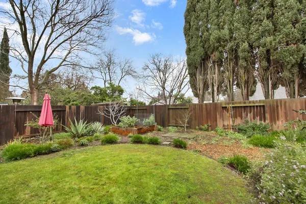 a backyard of a house with lots of green space